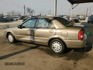 1999 Mazda Protege DX z VIN JM1BJ2223X0137153, wystawiony jako Copart lot #87899735 z przebiegiem 154 209 mil mil oraz Szkoda całkowita • Salvage title. Historia ofert i sprzedaży dostępna na DreamBid. Obrazek 2.