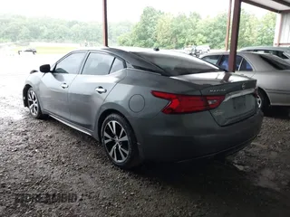 2018 Nissan Maxima Platinum z VIN 1N4AA6AP4JC390235, wystawiony jako IAAI lot #42376364 z przebiegiem 152 293 mil mil oraz . Historia ofert i sprzedaży dostępna na DreamBid. Obrazek 3.