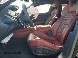 2023 Audi e-tron GT Prestige z VIN WAUEJBFW6P7004210, wystawiony jako Copart lot #88105605 z przebiegiem Nie podano mil oraz Szkoda całkowita • Salvage title. Historia ofert i sprzedaży dostępna na DreamBid. Obrazek 7.