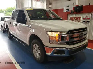 2018 Ford F-150 XL with VIN 1FTEW1E54JKC58977, listed as a IAAI auction lot 42353821 with 170,409 mi miles and . Bid and sale history available at DreamBid. Image 1.