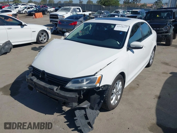 2012 Volkswagen Jetta SE with VIN 3VWDP7AJ3CM412988, listed as a IAAI auction lot 42528977 with 57,175 mi miles and . Bid and sale history available at DreamBid. Image 2.
