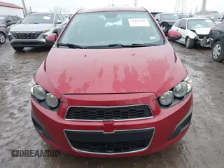 2013 Chevrolet Sonic LS z VIN 1G1JA6SH4D4244183, wystawiony jako IAAI lot #41467466 z przebiegiem 75 315 mil mil oraz . Historia ofert i sprzedaży dostępna na DreamBid. Obrazek 12.