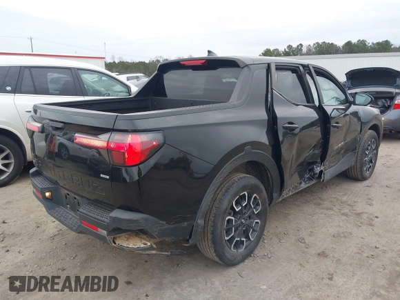 2022 Hyundai Santa Cruz SEL z VIN 5NTJBDAE5NH008011, wystawiony jako IAAI lot #41614699 z przebiegiem 57 484 mil mil oraz . Historia ofert i sprzedaży dostępna na DreamBid. Obrazek 4.