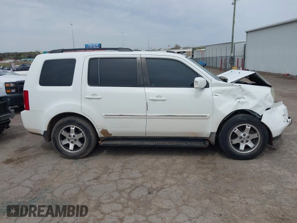 2009 Honda Pilot Touring with VIN 5FNYF48929B032510, listed as a IAAI auction lot 41945923 with 236,256 mi miles and . Bid and sale history available at carsss.com. Image 14.