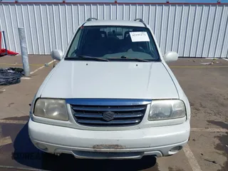 2002 Suzuki XL7 Standard z VIN JS3TX92V324125187, wystawiony jako IAAI lot #42195273 z przebiegiem 243 050 mil mil oraz . Historia ofert i sprzedaży dostępna na DreamBid. Obrazek 12.