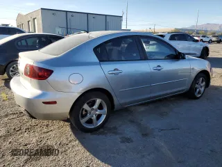 2004 Mazda 3 i with VIN JM1BK12F141168532, listed as a Copart auction lot 43964885 with 266,411 mi miles and Salvage Title. Bid and sale history available at DreamBid. Image 3.