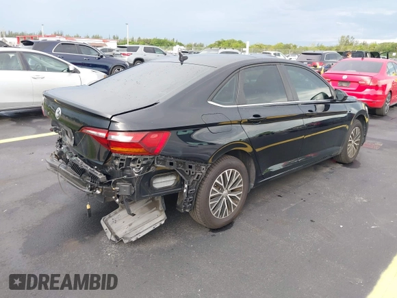 2019 Volkswagen Jetta SEL z VIN 3VWEB7BU2KM273950, wystawiony jako IAAI lot #42414034 z przebiegiem 84 100 mil mil oraz . Historia ofert i sprzedaży dostępna na DreamBid. Obrazek 4.