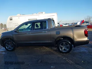 2022 Honda Ridgeline RTL-E with VIN 5FPYK3F79NB005152, listed as a IAAI auction lot 41754891 with 60,191 mi miles and . Bid and sale history available at DreamBid. Image 15.