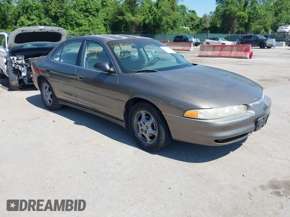 1999 Oldsmobile Intrigue GX z VIN 1G3WH52K5XF334949, wystawiony jako IAAI lot #42252647 z przebiegiem 80 705 mil mil oraz . Historia ofert i sprzedaży dostępna na DreamBid. Obrazek 1.