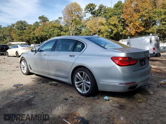 2018 BMW 7 Series 750i with VIN WBA7F0C53JGM22810, listed as a Copart auction lot 72796303 with 63,047 mi miles. Bid and sale history available at carsss.com. Image 2.