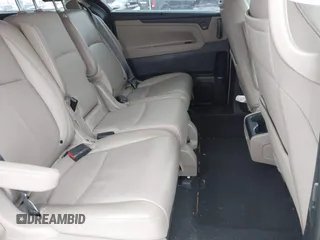 2023 Honda Odyssey Touring with VIN 5FNRL6H84PB048916, listed as a IAAI auction lot 41325052 with 50,290 mi miles and . Bid and sale history available at DreamBid. Image 8.