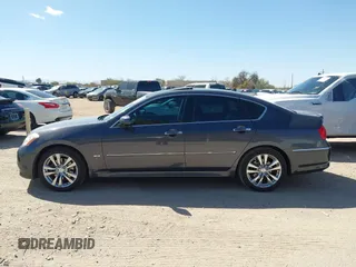 2010 Infiniti M with VIN JN1CY0AP0AM911640, listed as a IAAI auction lot 41549869 with 153,445 mi miles. Bid and sale history available at carsss.com. Image 14.