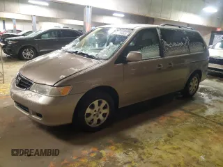2003 Honda Odyssey EX-L z VIN 5FNRL18933B103801, wystawiony jako Copart lot #89154885 z przebiegiem 239 033 mil mil oraz Nie do naprawy • Non repairable. Historia ofert i sprzedaży dostępna na DreamBid. Obrazek 1.