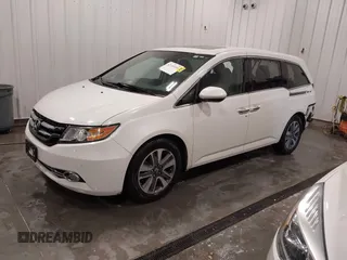 2015 Honda Odyssey Touring Elite with VIN 5FNRL5H92FB020159, listed as a IAAI auction lot 42103240 with 79,322 mi miles and . Bid and sale history available at DreamBid. Image 22.