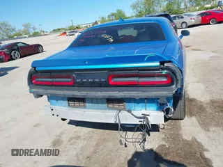 2015 Dodge Challenger SXT Plus with VIN 2C3CDZBG7FH901178, listed as a IAAI auction lot 42220878 with 123,146 mi miles and . Bid and sale history available at DreamBid. Image 16.