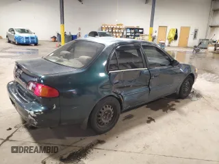 1999 Toyota Corolla VE with VIN 2T1BR12E2XC136739, listed as a Copart auction lot 60693625 with 170,989 mi miles and Salvage title. Bid and sale history available at DreamBid. Image 3.