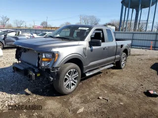2023 Ford F-150 XL with VIN 1FTEX1EP1PFA99559, listed as a Copart auction lot 52889755 with 6,801 mi miles and Salvage title. Bid and sale history available at DreamBid. Image 1.