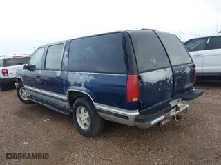 1994 Chevrolet Suburban with VIN 1GNEC16K3RJ360549, listed as a IAAI auction lot 42080890 with 126,804 mi miles. Bid and sale history available at carsss.com. Image 3.