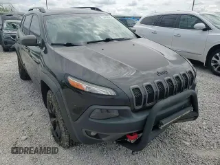 2016 Jeep Cherokee Trailhawk z VIN 1C4PJMBB8GW203534, wystawiony jako Copart lot #54403945 z przebiegiem 168 080 mil mil oraz Szkoda całkowita • Salvage title. Historia ofert i sprzedaży dostępna na DreamBid. Obrazek 14.