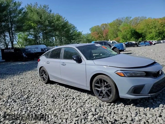 2023 Honda Civic Sport z VIN 19XFL2H85PE004313, wystawiony jako Copart lot #54268555 z przebiegiem Nie podano mil oraz Szkoda całkowita • Salvage title. Historia ofert i sprzedaży dostępna na DreamBid. Obrazek 13.