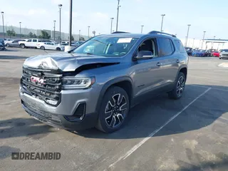2021 GMC Acadia SLE with VIN 1GKKNKLA4MZ168921, listed as a IAAI auction lot 41562602 with 26,370 mi miles and . Bid and sale history available at DreamBid. Image 2.