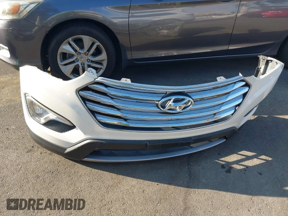 2016 Hyundai Santa Fe SE with VIN KM8SR4HF1GU141799, listed as a IAAI auction lot 41348405 with 99,884 mi miles. Bid and sale history available at carsss.com. Image 12.