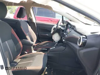 2023 Nissan Versa SR z VIN 3N1CN8FV4PL870186, wystawiony jako IAAI lot #42458430 z przebiegiem 22 mil mil oraz . Historia ofert i sprzedaży dostępna na DreamBid. Obrazek 5.