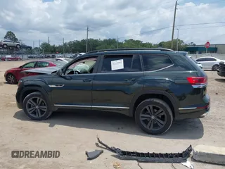 2021 Volkswagen Atlas SE z VIN 1V2PR2CA7MC510191, wystawiony jako IAAI lot #42235942 z przebiegiem 108 597 mil mil oraz . Historia ofert i sprzedaży dostępna na DreamBid. Obrazek 14.