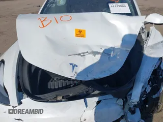 2022 Tesla Model 3 with VIN 5YJ3E1EA5NF315004, listed as a IAAI auction lot 41429800 with Not Provided miles. Bid and sale history available at carsss.com. Image 10.