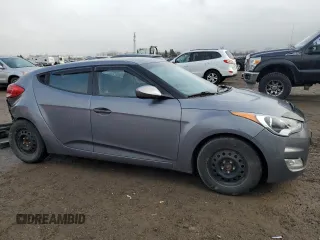 2012 Hyundai Veloster w/Black Int z VIN KMHTC6ADXCU025876, wystawiony jako Copart lot #50377835 z przebiegiem 185 181 mil mil oraz Czysty tytuł • Clean title. Historia ofert i sprzedaży dostępna na DreamBid. Obrazek 4.