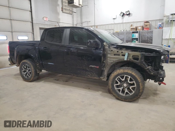 2021 GMC Canyon 4WD AT4 w/Cloth with VIN 1GTG6FEN2M1265863, listed as a Copart auction lot 49900865 with 50,102 mi miles and Salvage Title. Bid and sale history available at carsss.com. Image 4.