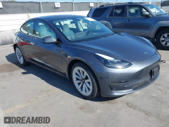 2023 Tesla Model 3 Long Range z VIN 5YJ3E1EB7PF704061, wystawiony jako IAAI lot #42079045 z przebiegiem 4 012 mil mil oraz . Historia ofert i sprzedaży dostępna na DreamBid. Obrazek 1.