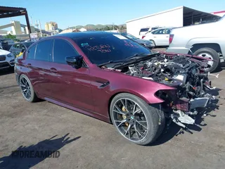 2019 BMW M5 z VIN WBSJF0C55KB284980, wystawiony jako IAAI lot #39406520 z przebiegiem 24 919 mil mil oraz . Historia ofert i sprzedaży dostępna na DreamBid. Obrazek 1.