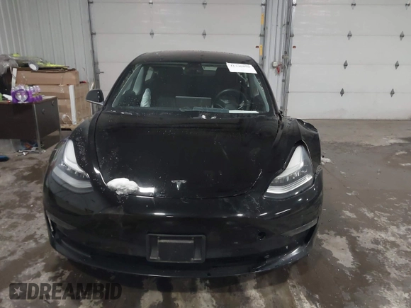2018 Tesla Model 3 Long Range Battery with VIN 5YJ3E1EB7JF086778, listed as a IAAI auction lot 41348008 with 74,491 mi miles and . Bid and sale history available at DreamBid. Image 12.