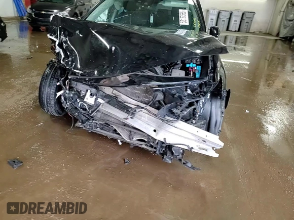 2021 Toyota Camry Hybrid LE with VIN 4T1C31AK5MU552002, listed as a Copart auction lot 52137565 with 91,780 mi miles and Salvage Title. Bid and sale history available at DreamBid. Image 14.