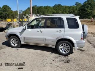 2004 Suzuki Grand Vitara z VIN JS3TE62V544100024, wystawiony jako Copart lot #75613324 z przebiegiem Nie podano mil oraz Czysty tytuł • Clean title. Historia ofert i sprzedaży dostępna na DreamBid. Obrazek 2.