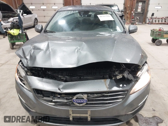 2016 Volvo S60 T5 Premier z VIN YV1612TK0G2410743, wystawiony jako IAAI lot #41717318 z przebiegiem 87 087 mil mil oraz . Historia ofert i sprzedaży dostępna na DreamBid. Obrazek 6.