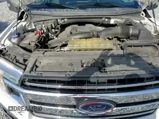 2020 Ford F-150 XL с VIN 1FTFW1E46LKD54169, выставлен на аукционе Copart как лот 85263215 с пробегом 99 763 миль миль и Списание • Salvage title. История ставок и продаж доступна на DreamBid. Изображение 13.