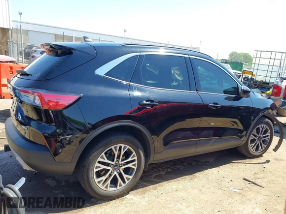 2020 Ford Escape SEL z VIN 1FMCU9H91LUB86584, wystawiony jako IAAI lot #42268456 z przebiegiem 94 753 mil mil oraz . Historia ofert i sprzedaży dostępna na DreamBid. Obrazek 14.