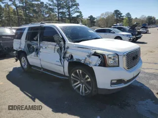 2015 GMC Yukon Denali with VIN 1GKS1CKJ9FR566390, listed as a Copart auction lot 48472835 with 167,719 mi miles and Salvage Title. Bid and sale history available at carsss.com. Image 4.