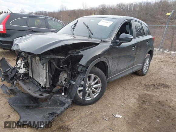 2015 Mazda CX-5 Sport with VIN JM3KE4BY9F0495948, listed as a IAAI auction lot 41501840 with 145,959 mi miles. Bid and sale history available at carsss.com. Image 18.