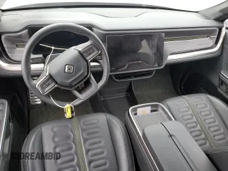 2024 Rivian R1S Adventure with VIN 7PDSGABA6RN041211, listed as a Copart auction lot 87167654 with Not Provided miles and Salvage Title. Bid and sale history available at carsss.com. Image 8.