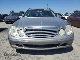 2005 Mercedes-Benz E 500 with VIN WDBUH83J35X168838, listed as a Copart auction lot 69885014 with 203,187 mi miles and Salvage Title. Bid and sale history available at carsss.com. Image 5.