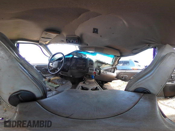 1999 GMC Suburban with VIN 1GDFK16R0XJ728255, listed as a IAAI auction lot 42230595 with Not provided miles and . Bid and sale history available at DreamBid. Image 18.