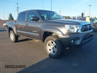 2012 Toyota Tacoma PreRunner z VIN 5TFJU4GN1CX013028, wystawiony jako IAAI lot #41967040 z przebiegiem 139 822 mil mil oraz . Historia ofert i sprzedaży dostępna na DreamBid. Obrazek 1.