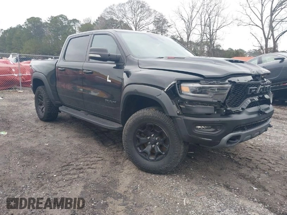 2022 Ram 1500 TRX with VIN 1C6SRFU9XNN476106, listed as a IAAI auction lot 41627895 with 21,992 mi miles and . Bid and sale history available at DreamBid. Image 1.