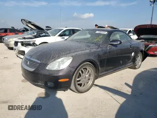 2002 Lexus SC 430 with VIN JTHFN48Y520034983, listed as a Copart auction lot 74084354 with 88,979 mi miles and Salvage Title. Bid and sale history available at carsss.com. Image 1.