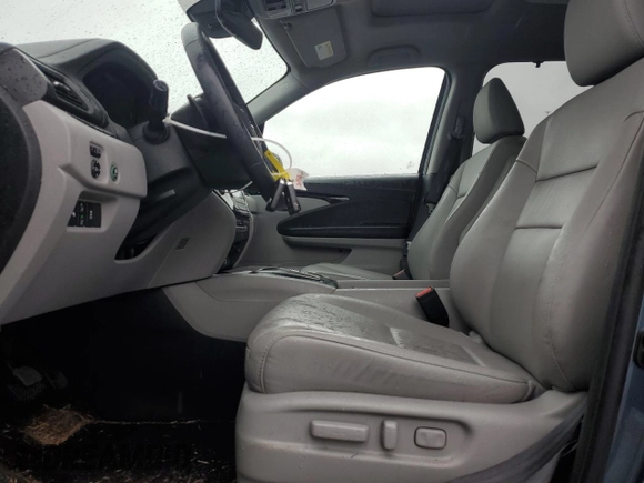 2022 Honda Pilot Touring 7-Passenger z VIN 5FNYF5H63NB015091, wystawiony jako Copart lot #56323725 z przebiegiem 28 614 mil mil oraz Szkoda całkowita • Salvage title. Historia ofert i sprzedaży dostępna na DreamBid. Obrazek 7.