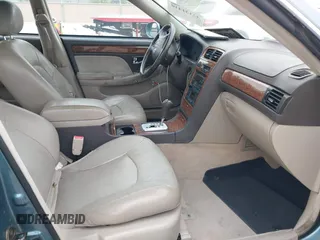 2004 Hyundai XG with VIN KMHFU45E24A363583, listed as a IAAI auction lot 42131410 with 151,476 mi miles. Bid and sale history available at carsss.com. Image 5.