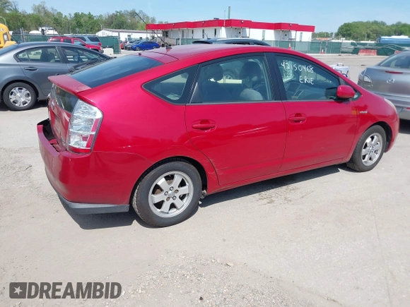2009 Toyota Prius with VIN JTDKB20U293475940, listed as a IAAI auction lot 42150468 with 112,556 mi miles and . Bid and sale history available at DreamBid. Image 4.